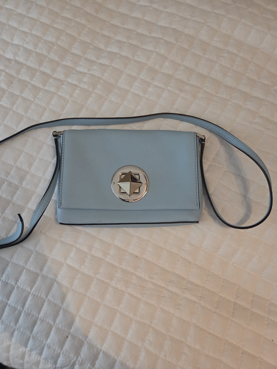 kate spade Handbags - kate spade Light Blue Crossbody Bag with Silver Star Emblem